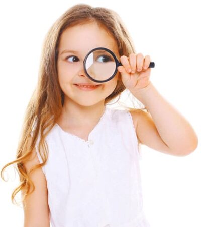 a child kid looking for a good smile with glasses and is very happy with braces treatment